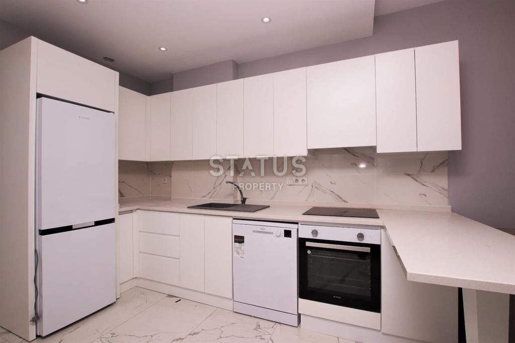 Двухкомнатная квартира с мебелью в новом комплексе в 100 метрах от пляжа в центре Аланьи. 50м2 фото 4