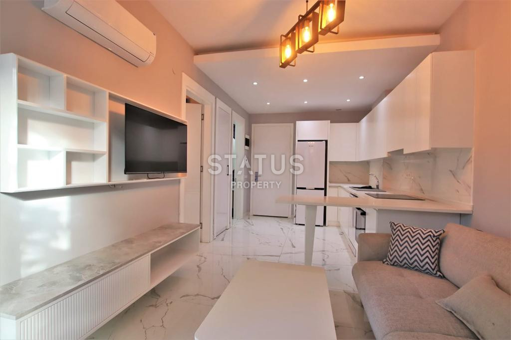 Двухкомнатная квартира с мебелью в новом комплексе в 100 метрах от пляжа в центре Аланьи. 50м2 фото 5