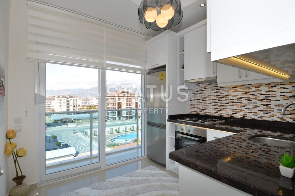 Меблированный пентхаус с потрясающим видом на море и могучие горы, в комплексе на первой линии. Отличная цена! фото 8