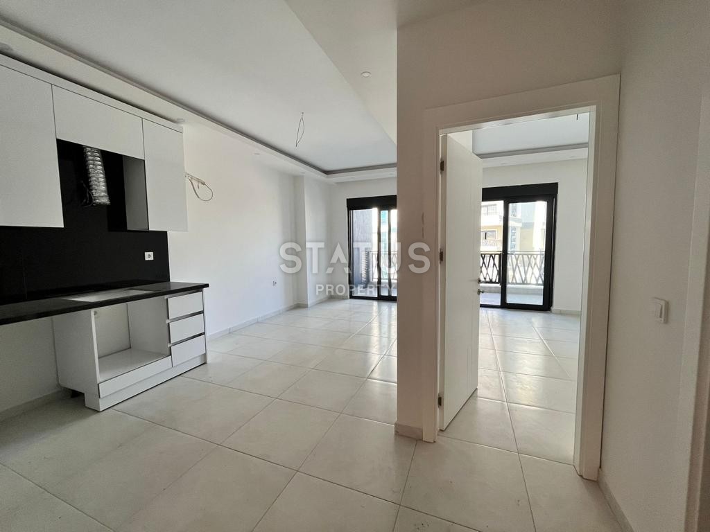 Комфортабельная двухкомнатная квартира в районе Махмутлар. 56м2 фото 3