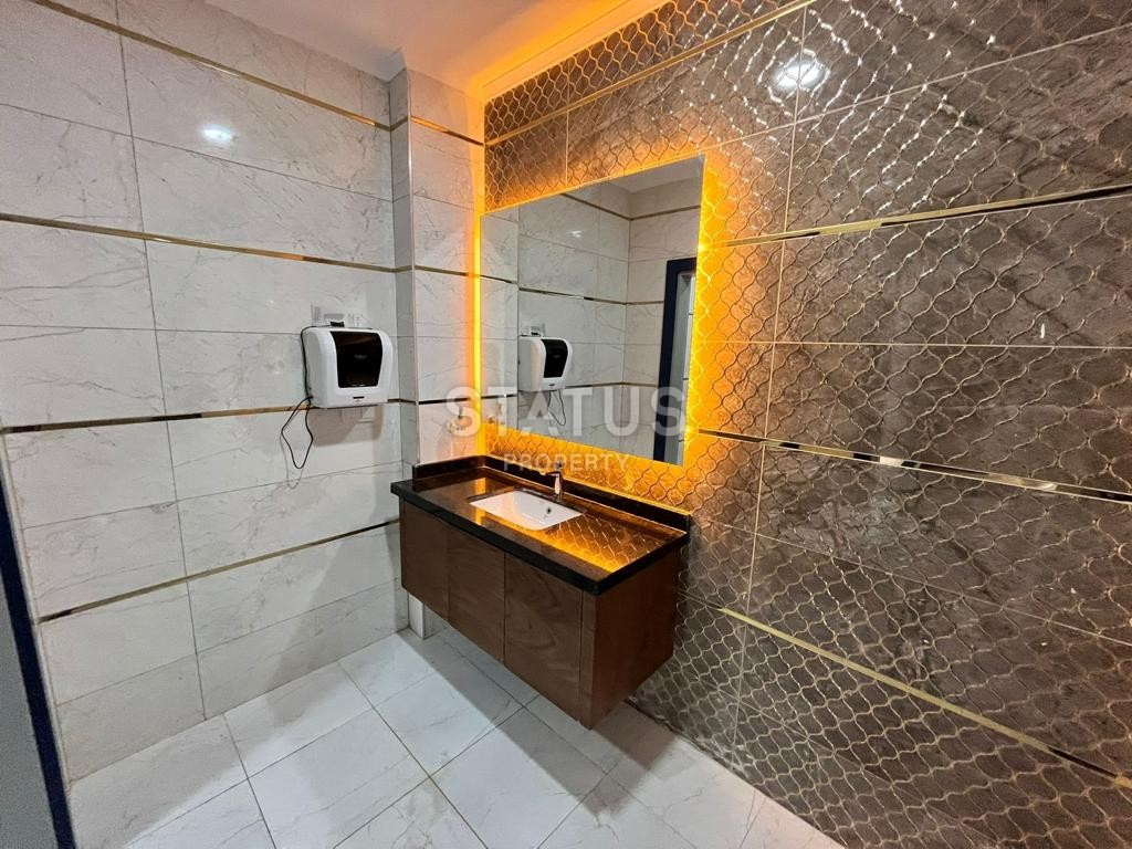 Комфортабельная двухкомнатная квартира в районе Махмутлар. 56м2 фото 9