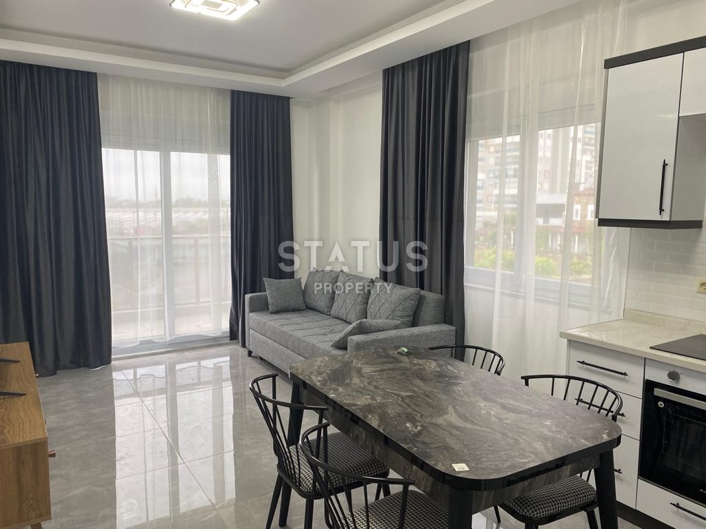 Двухкомнатная квартира с мебелью в новом комплексе в районе Авсалар.58м2 фото 3