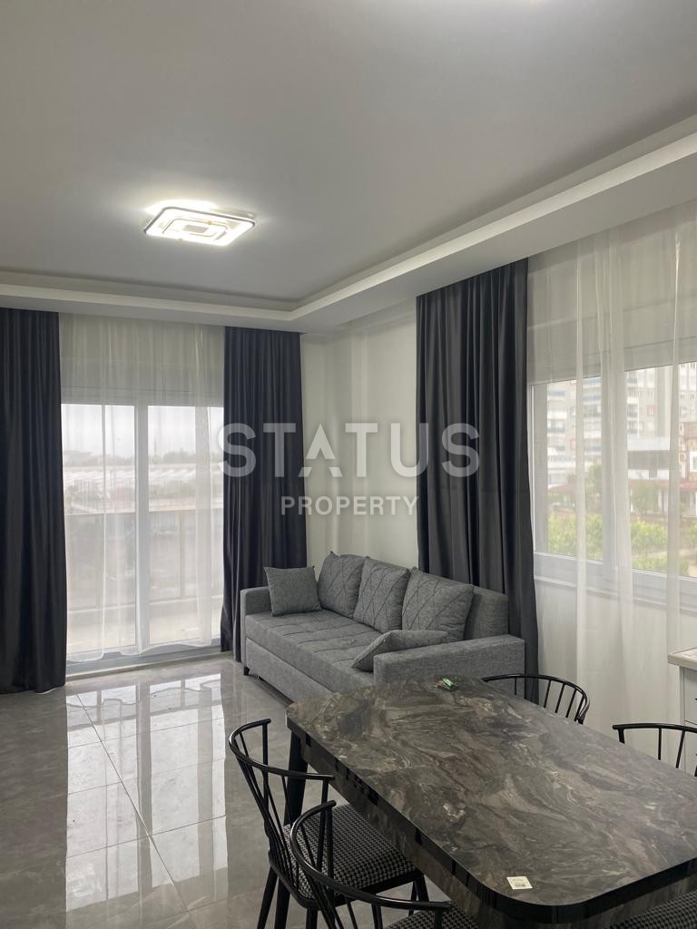 Двухкомнатная квартира с мебелью в новом комплексе в районе Авсалар.58м2 фото 4