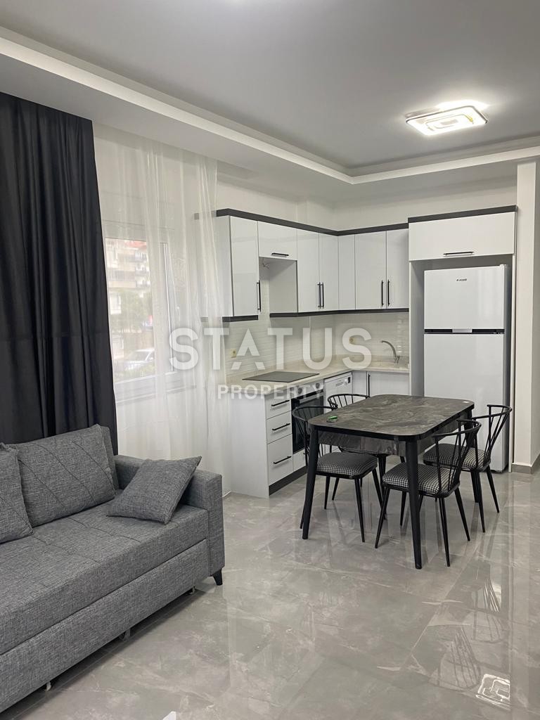 Двухкомнатная квартира с мебелью в новом комплексе в районе Авсалар.58м2 фото 5