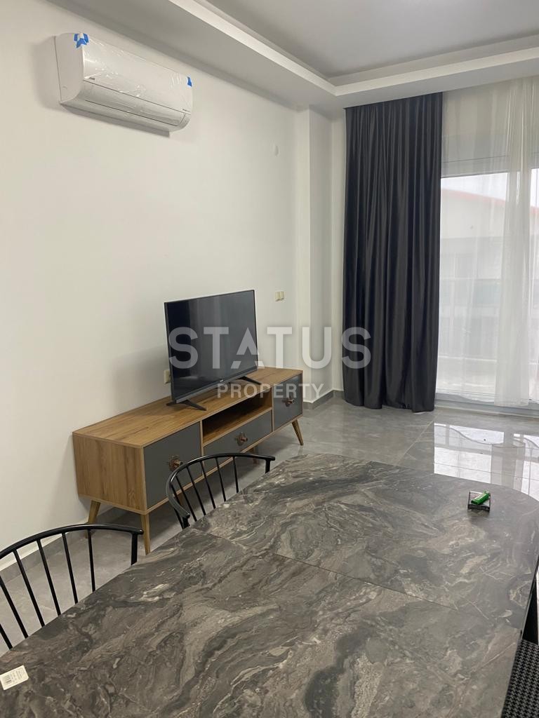 Двухкомнатная квартира с мебелью в новом комплексе в районе Авсалар.58м2 фото 6