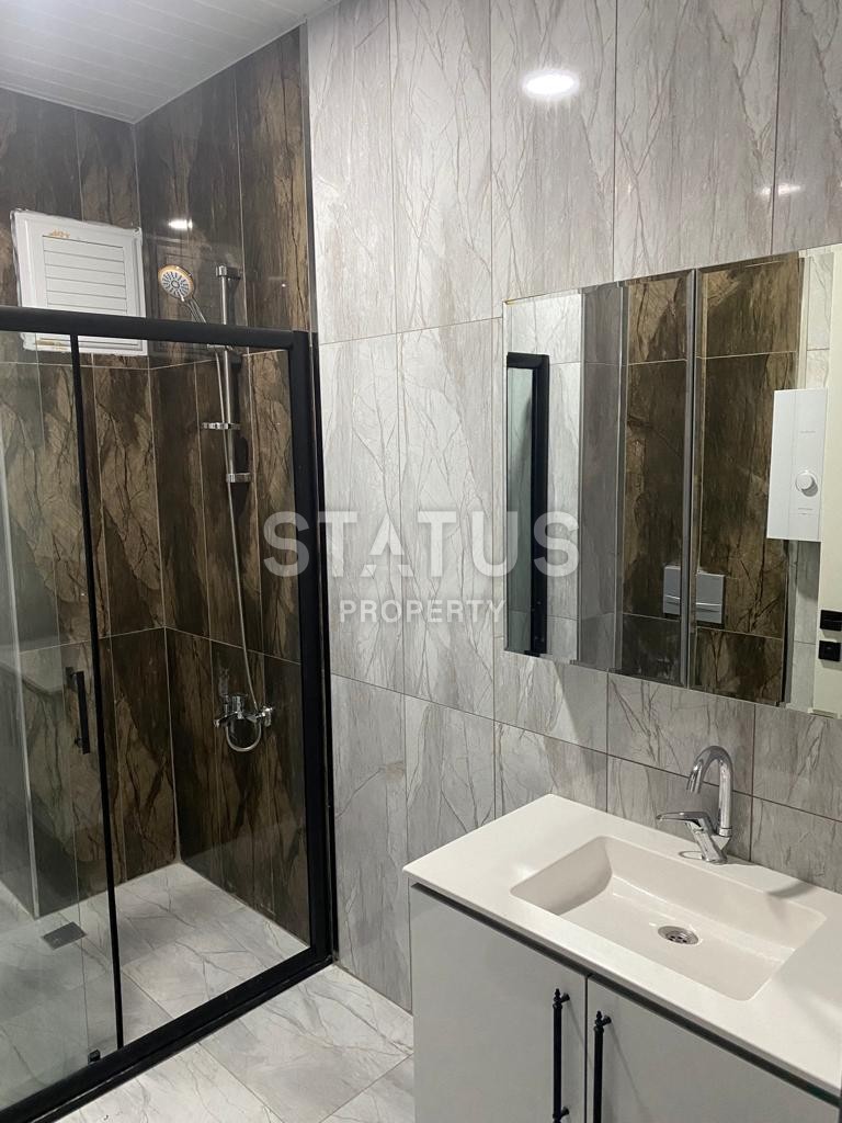 Двухкомнатная квартира с мебелью в новом комплексе в районе Авсалар.58м2 фото 8