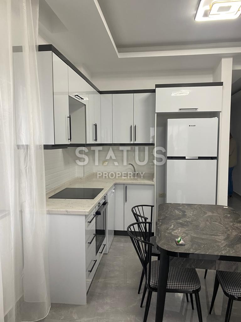 Двухкомнатная квартира с мебелью в новом комплексе в районе Авсалар.58м2 фото 10