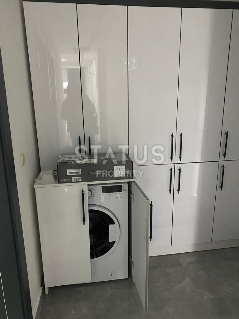 Двухкомнатная квартира с мебелью в новом комплексе в районе Авсалар.58м2 фото 12