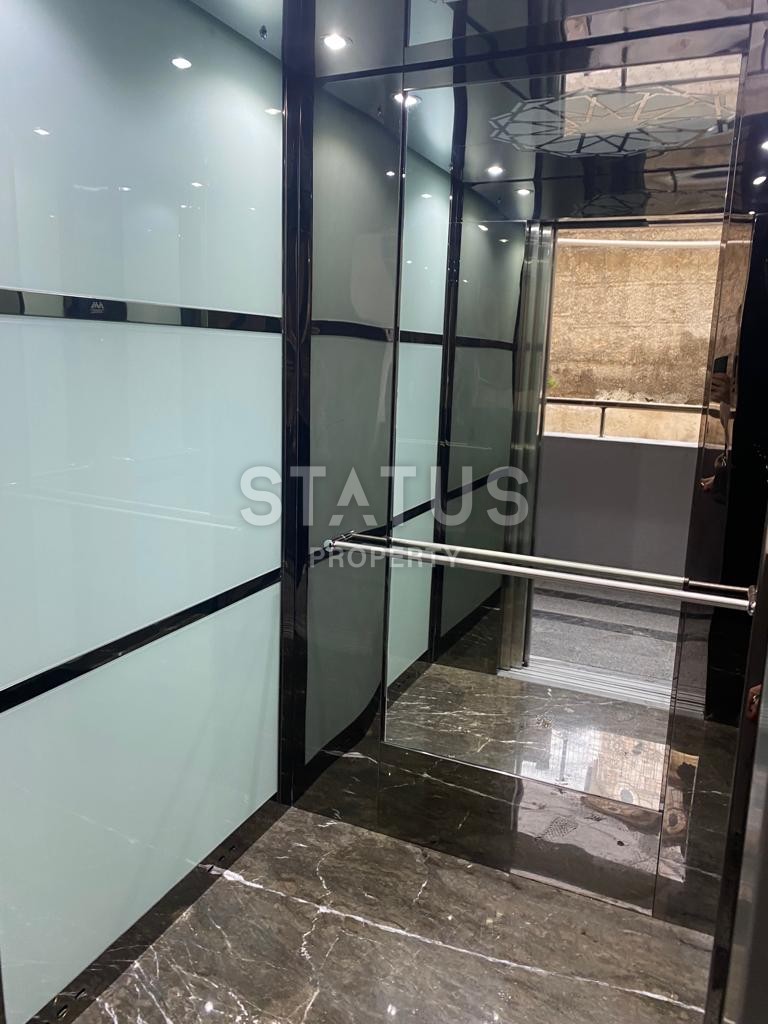 Двухкомнатная квартира с мебелью в новом комплексе в районе Авсалар.58м2 фото 15