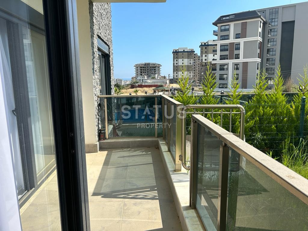 Двухкомнатная квартира с садом в Авсалларе, 66 м2 фото 11