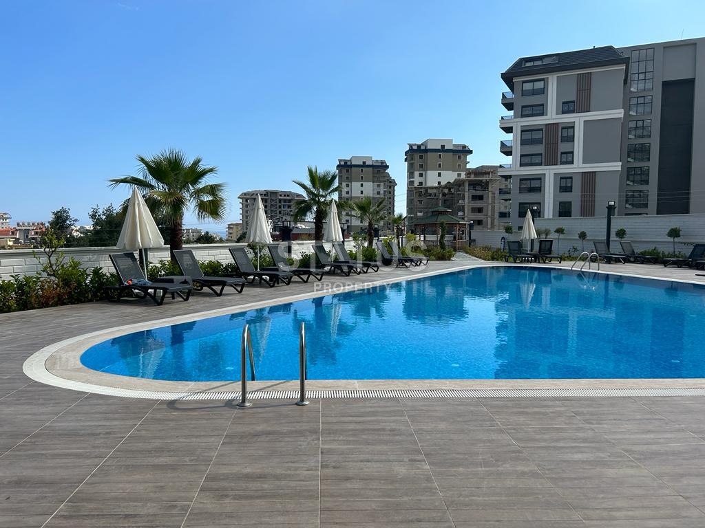 Двухкомнатная квартира с садом в Авсалларе, 66 м2 фото 15