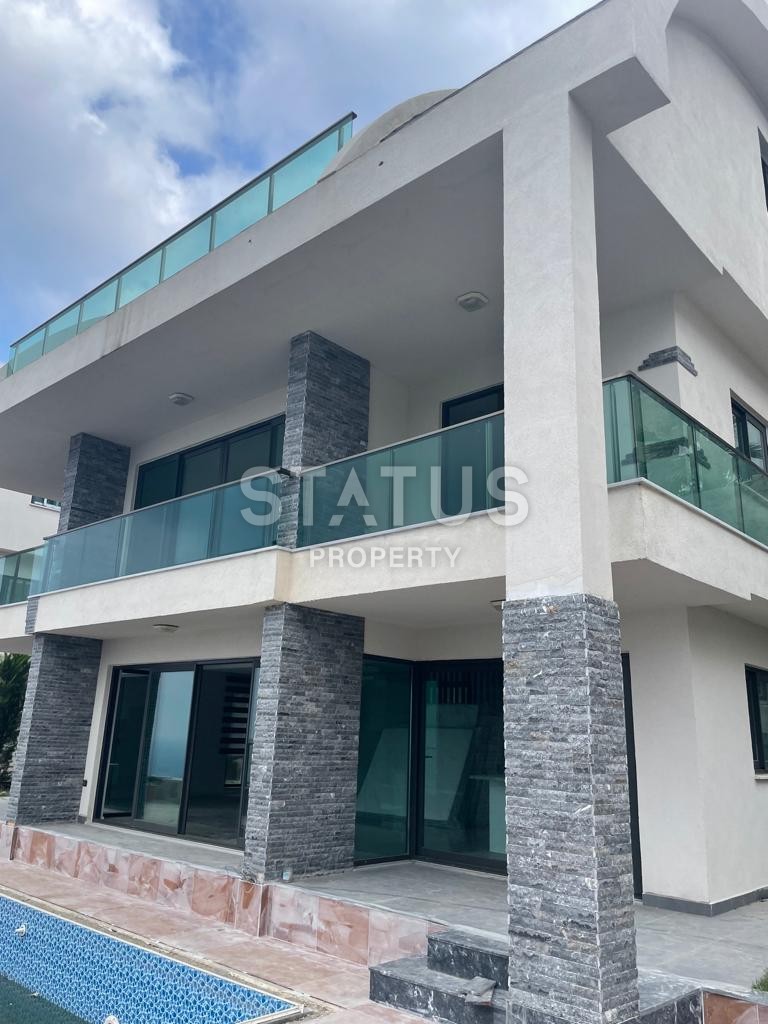 Three-storey villa 5+1 in a complex of villas on the first coastline in Kargicak, 350m2 фото 10