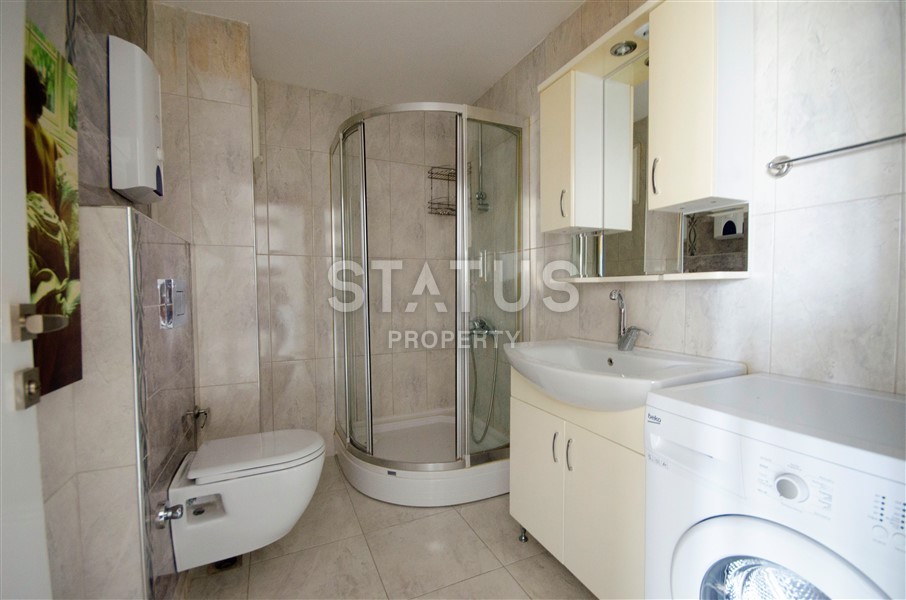 Стильная квартира с мебелью в новом комплексе в районе Махмутлар фото 11