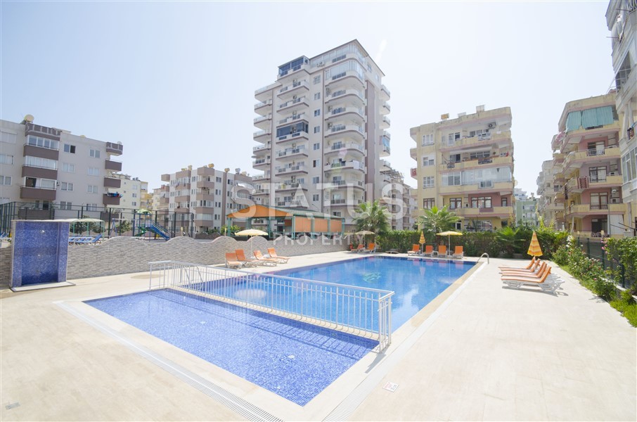 Стильная квартира с мебелью в новом комплексе в районе Махмутлар фото 12