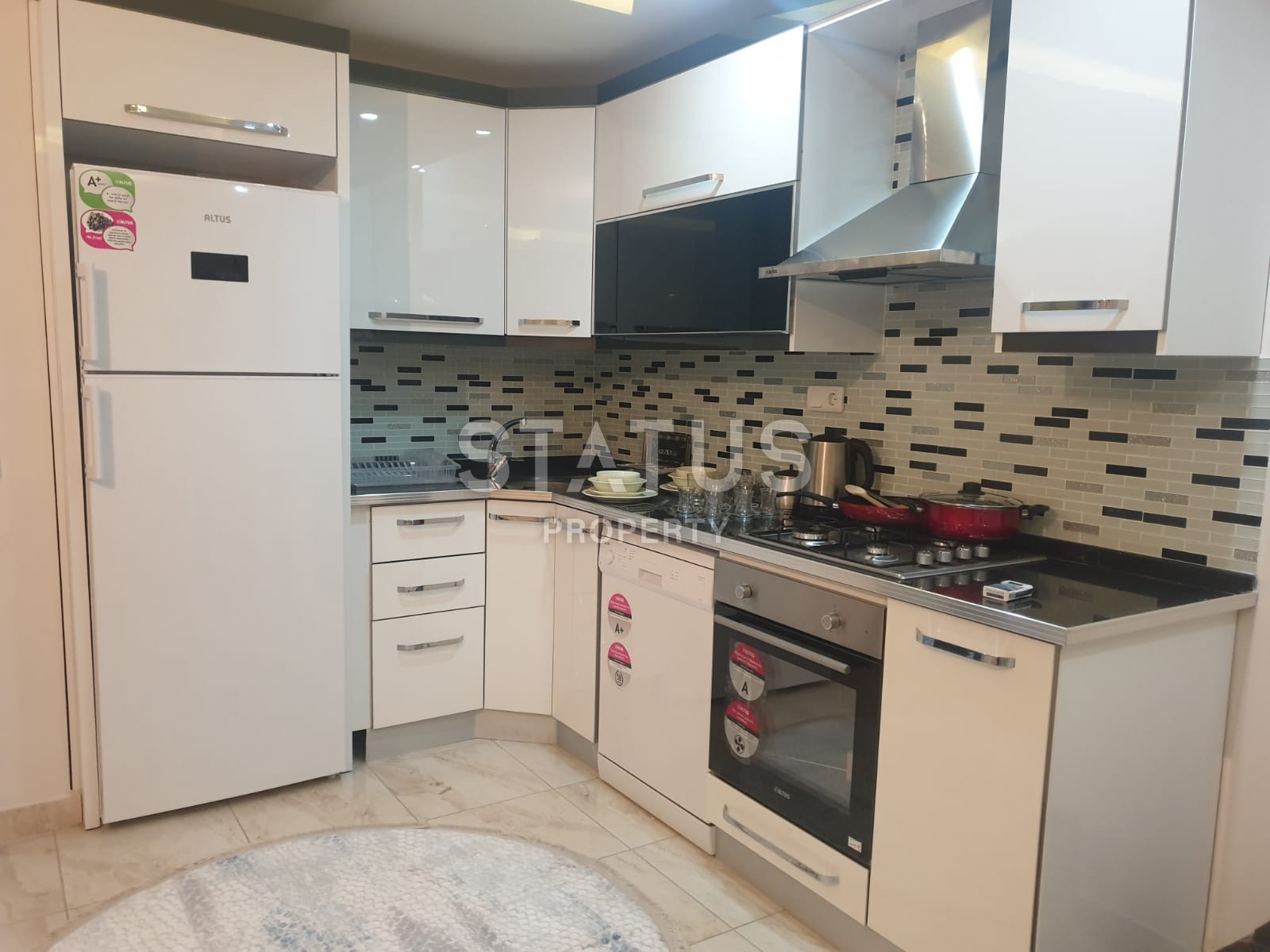 Меблированная двухкомнатная квартира в центре района Махмутлар, 75 м2 фото 7