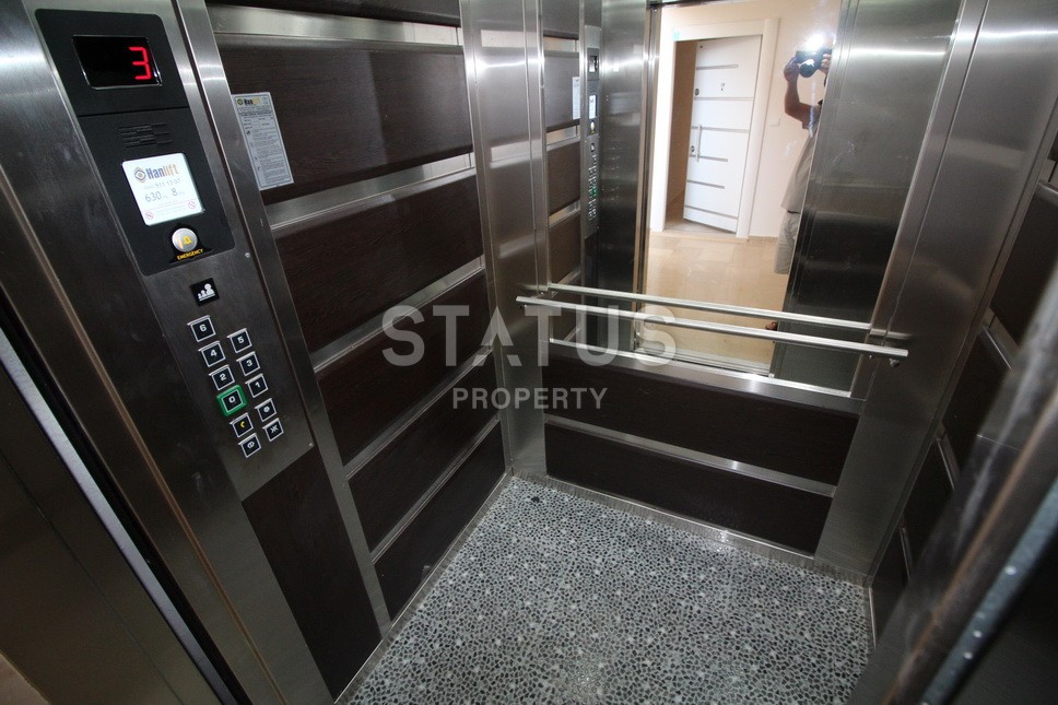 Меблированная двухкомнатная квартира в центре района Махмутлар, 75 м2 фото 19