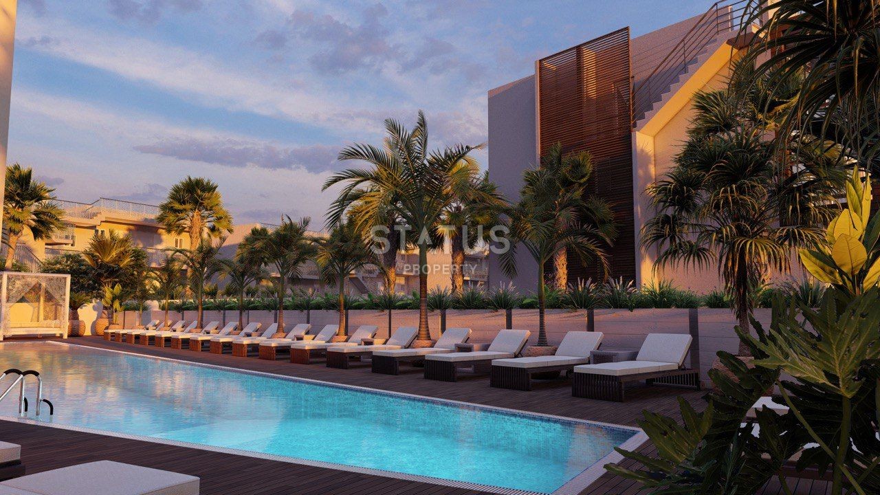 Трехкомнатные апартаменты 83 м2 с садом в новом комплексе в Эсентепе фото 52