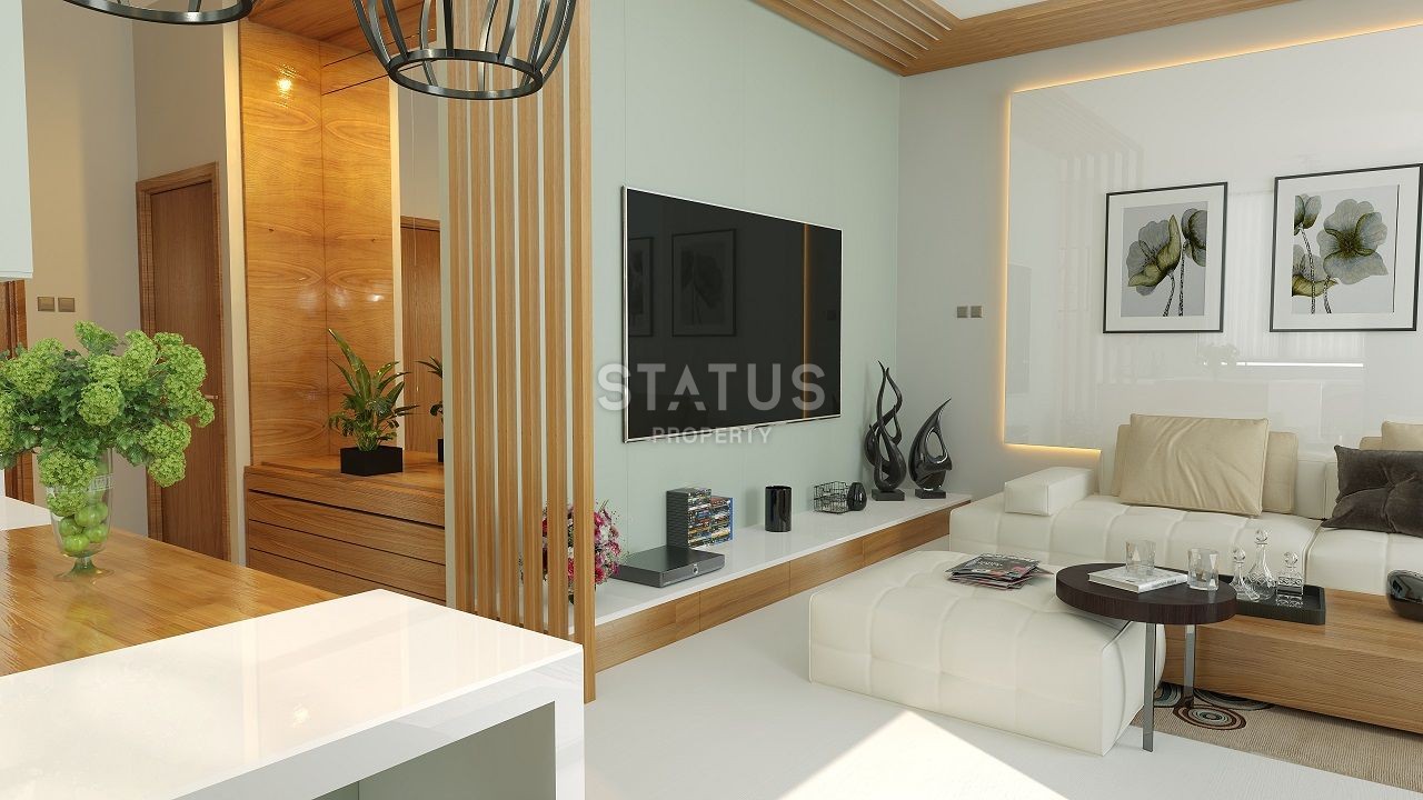 Three-room apartment of 89 m2 with a front garden in a new and luxurious complex in Esentepe фото 3