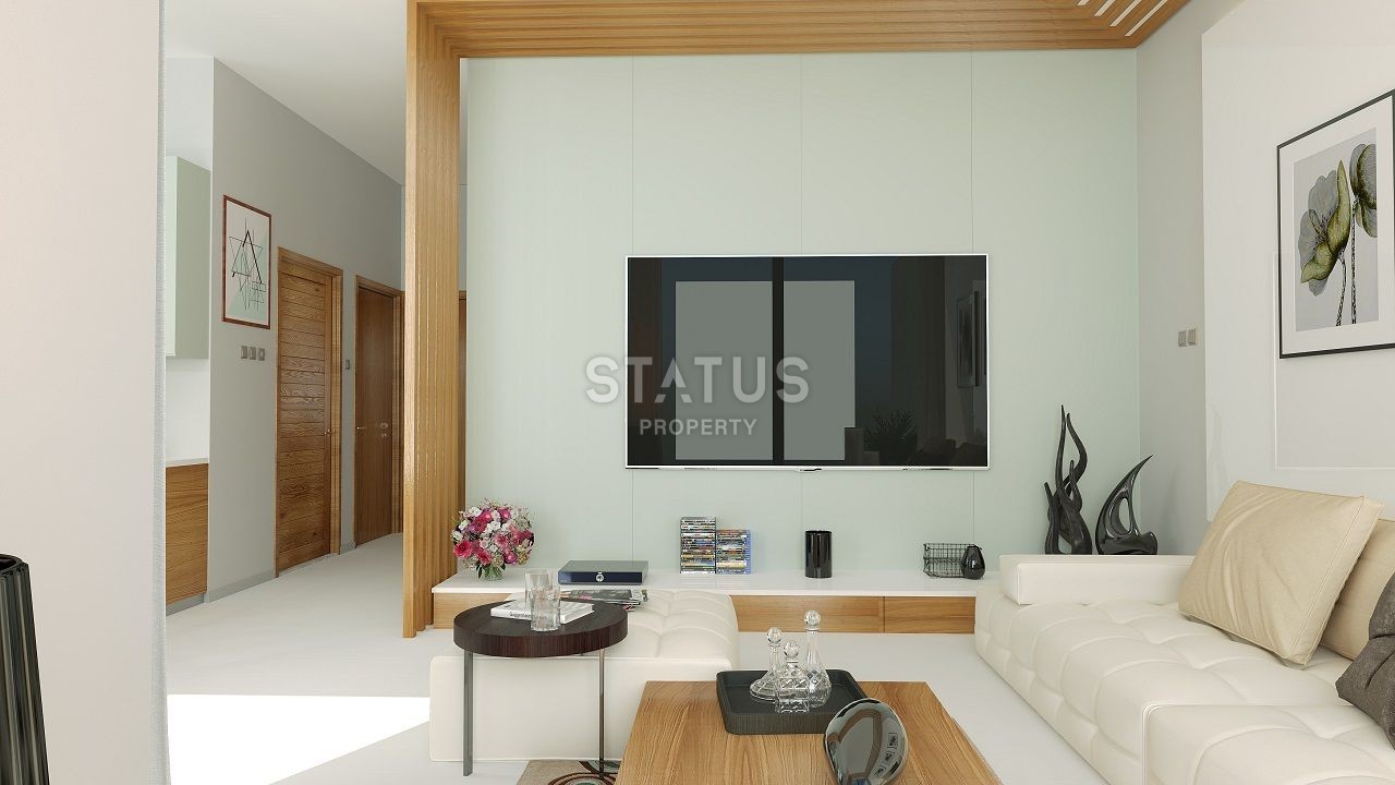 Three-room apartment of 89 m2 with a front garden in a new and luxurious complex in Esentepe фото 7