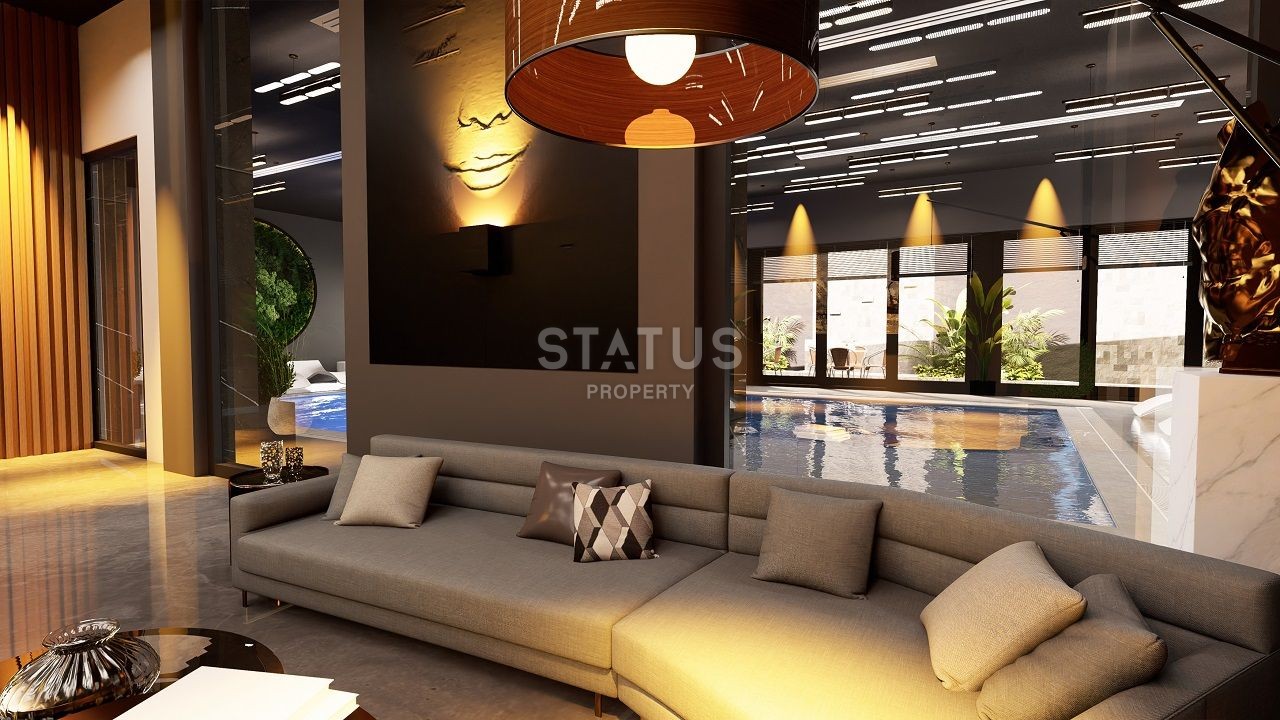 Three-room apartment of 89 m2 with a front garden in a new and luxurious complex in Esentepe фото 12