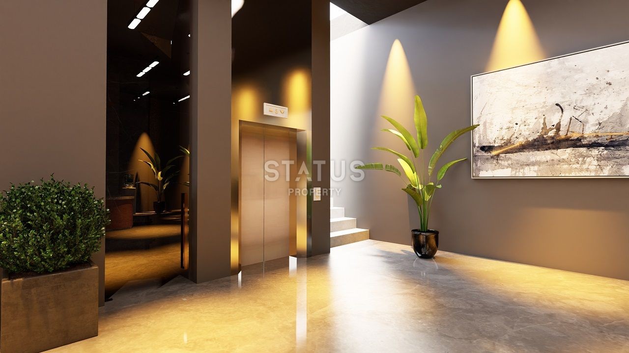 Three-room apartment of 89 m2 with a front garden in a new and luxurious complex in Esentepe фото 14