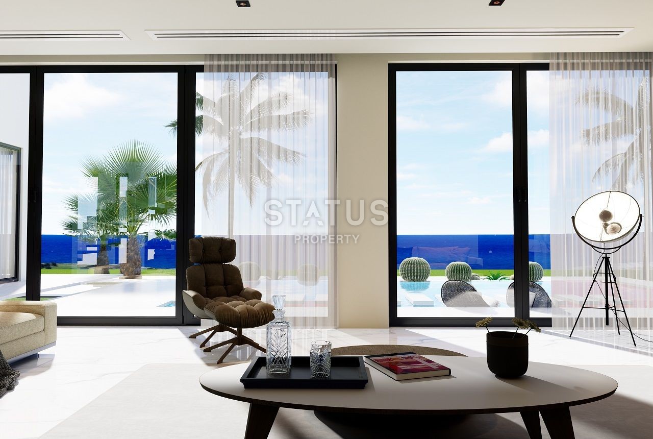 Villa 4+1 ( 382 m2) with a pool on the beach in Esentepe фото 13