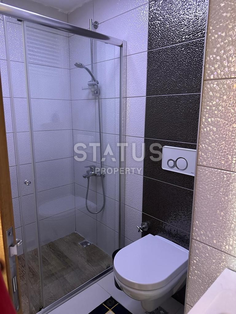 Меблированная квартира 1+1 в двух шагах от моря в Махмутларе, 55м2 фото 10