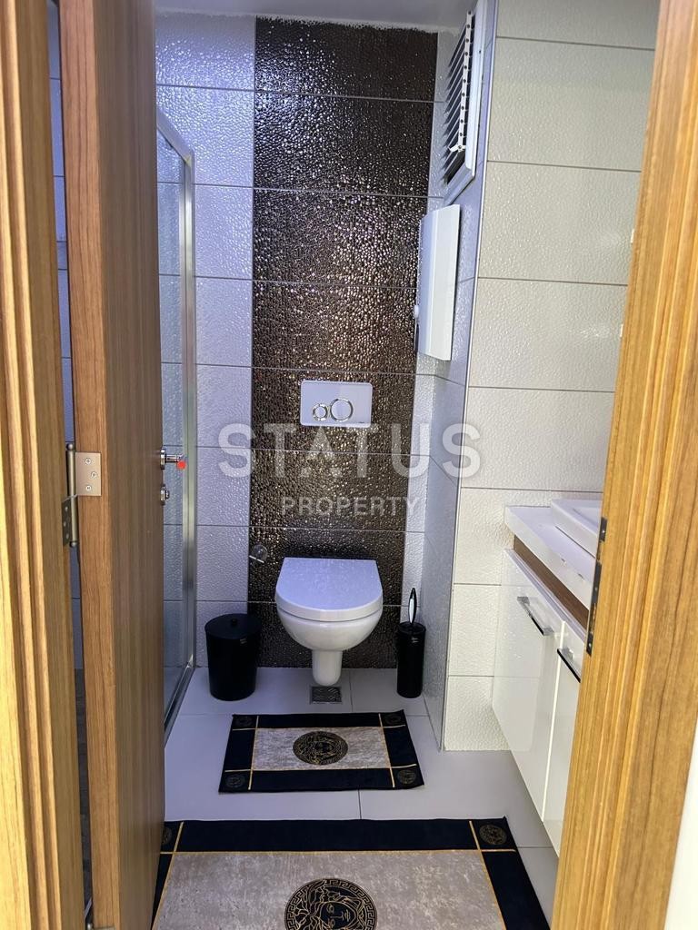 Меблированная квартира 1+1 в двух шагах от моря в Махмутларе, 55м2 фото 20