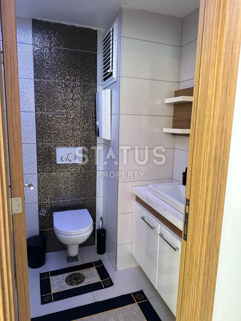 Меблированная квартира 1+1 в двух шагах от моря в Махмутларе, 55м2 фото 27