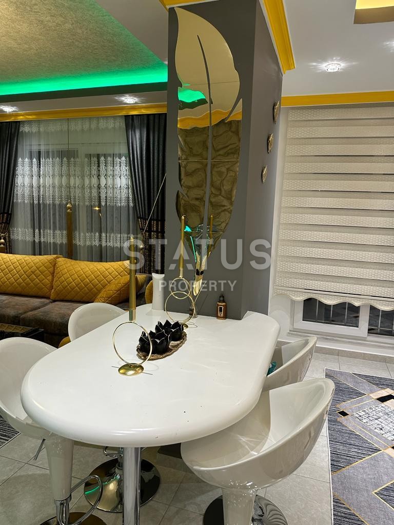 Просторные апартаменты 2+1 с дизайнерским ремонтом и мебелью в районе Махмутлар, 120м2 фото 3