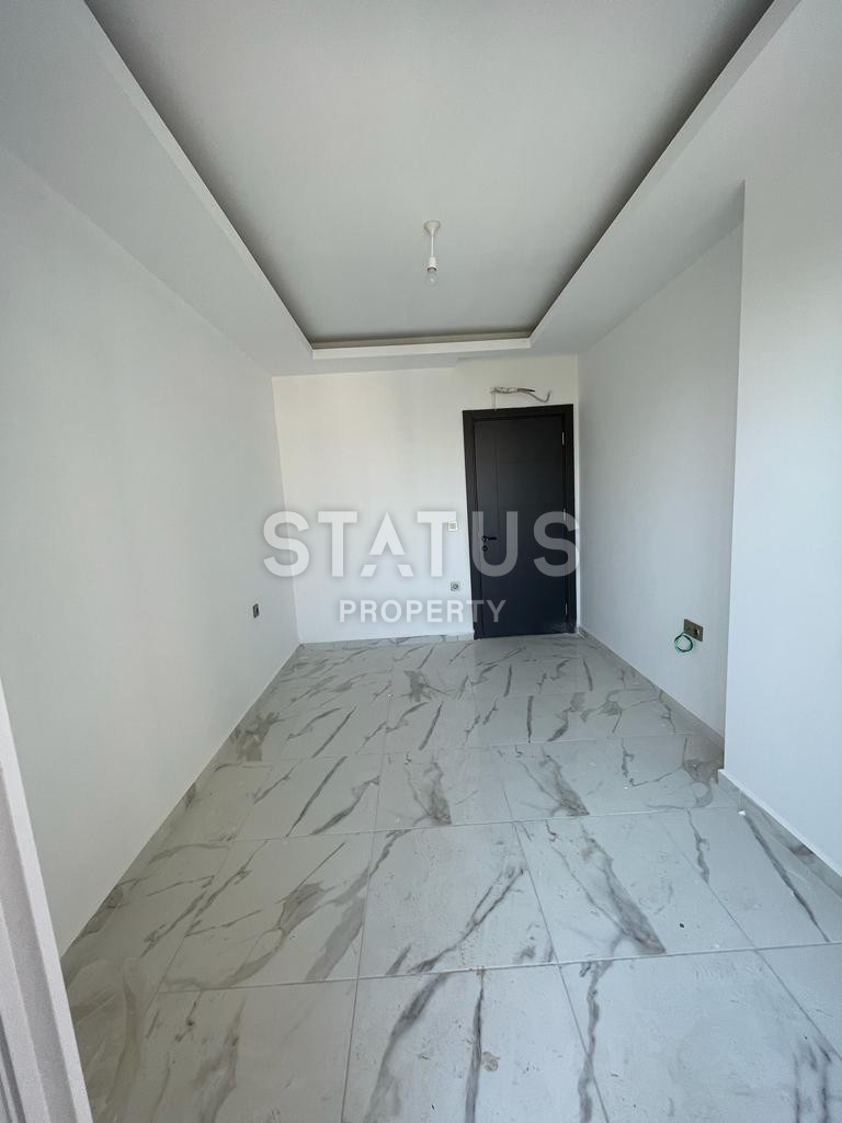 Просторная  новая трёхкомнатная квартира без мебели  в Махмутларе,  80м2 фото 3