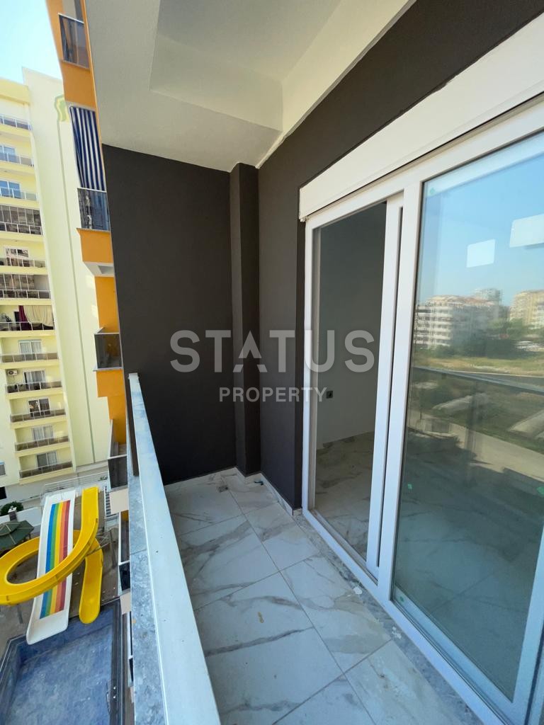 Просторная  новая трёхкомнатная квартира без мебели  в Махмутларе,  80м2 фото 14