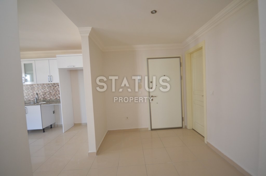 Недорогая квартира в Махмутларе с красивым видом на горы и боковым видом на море. 100 кв.м. фото 5