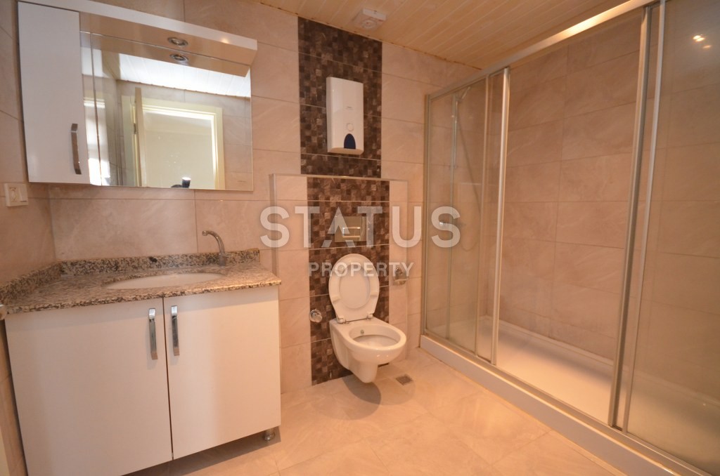 Недорогая квартира в Махмутларе с красивым видом на горы и боковым видом на море. 100 кв.м. фото 7