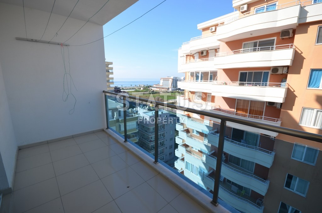 Недорогая квартира в Махмутларе с красивым видом на горы и боковым видом на море. 100 кв.м. фото 10