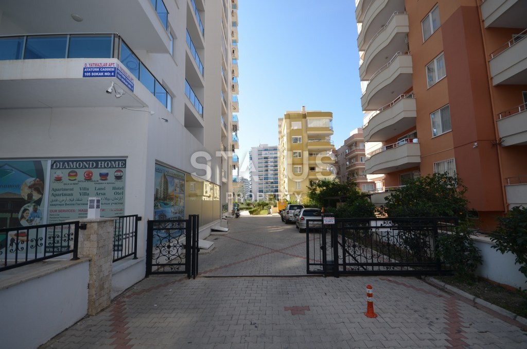 Недорогая квартира в Махмутларе с красивым видом на горы и боковым видом на море. 100 кв.м. фото 11