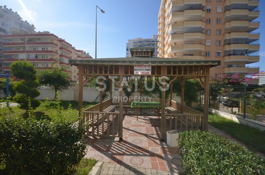 Недорогая квартира в Махмутларе с красивым видом на горы и боковым видом на море. 100 кв.м. фото 16