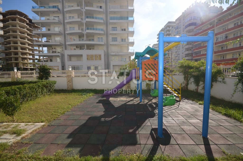 Недорогая квартира в Махмутларе с красивым видом на горы и боковым видом на море. 100 кв.м. фото 17