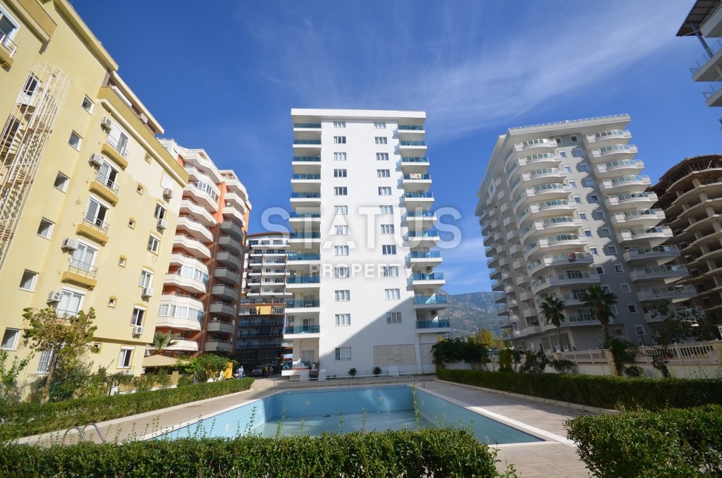 Недорогая квартира в Махмутларе с красивым видом на горы и боковым видом на море. 100 кв.м. фото 18