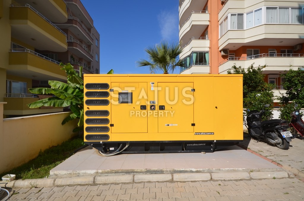 Недорогая квартира в Махмутларе с красивым видом на горы и боковым видом на море. 100 кв.м. фото 19