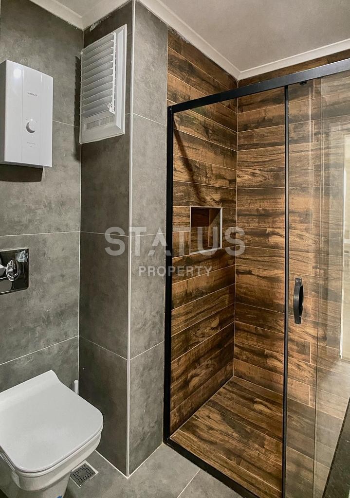 Квартира 1+1 в самом центре Алании в новом доме, 50м2 фото 13