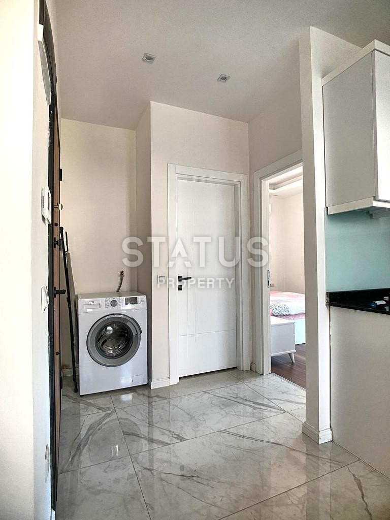 Квартира 1+1 в самом центре Алании в новом доме, 50м2 фото 14