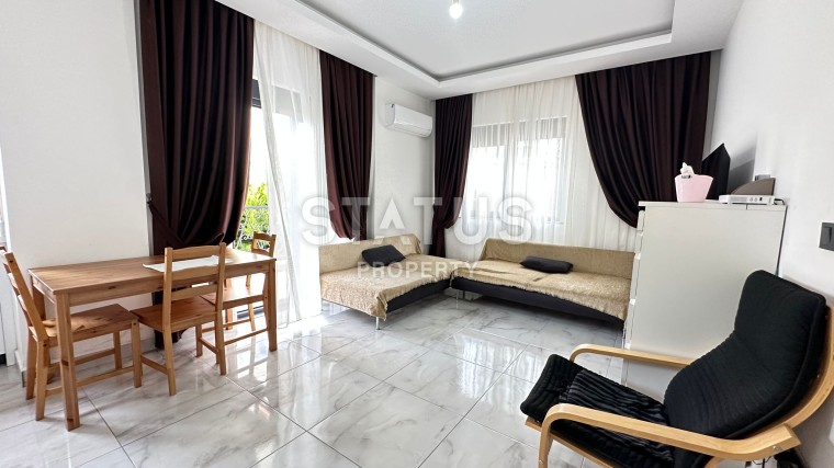 Квартира 1+1 в жилом комплексе в центре Махмутлара, 50м2 фото 1