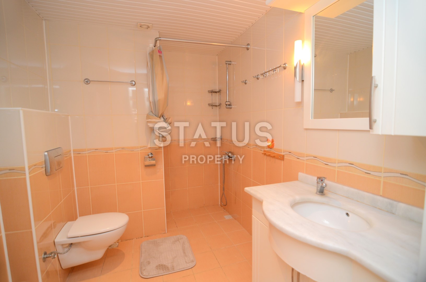 Огромная квартира в Махмутларе планировки 1+1 с мебелью 82 кв.м. фото 9