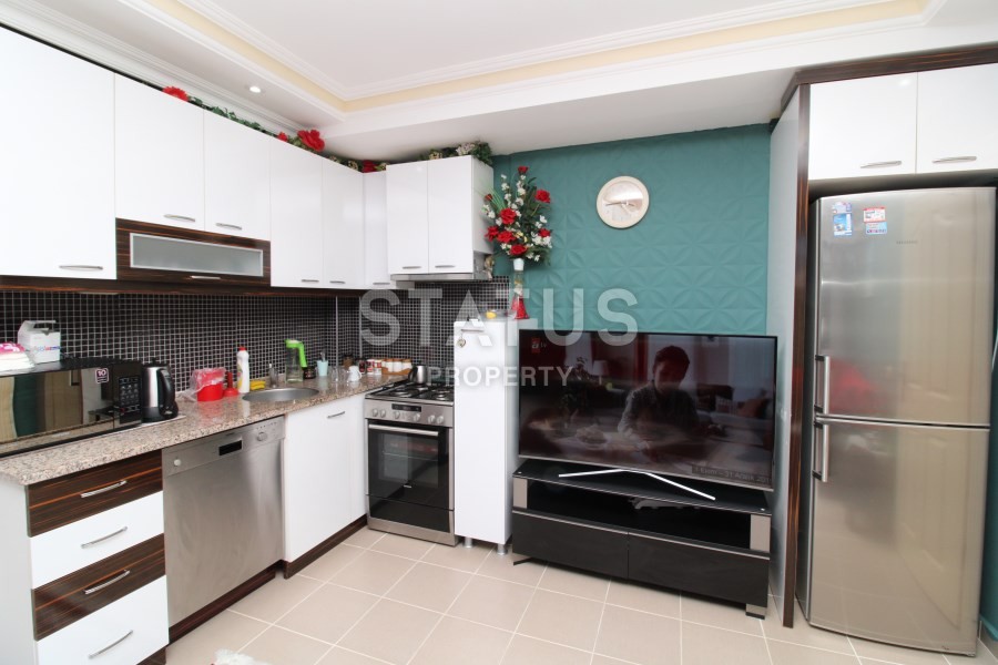 Меблированная двухкомнатная квартира в Махмутларе по отличной стоимости, 70 м2. фото 3