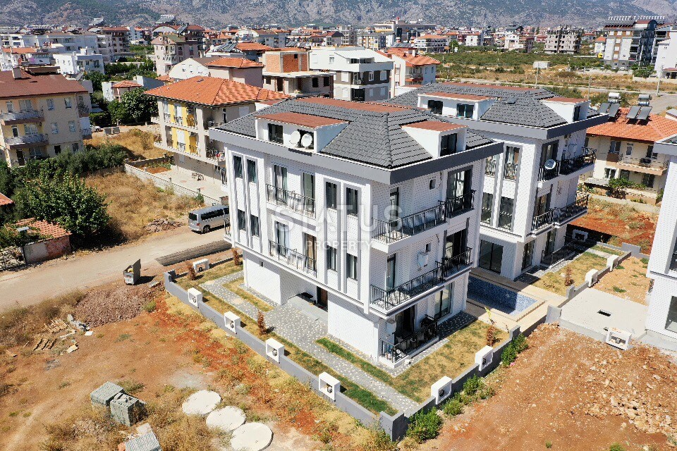 Прекрасный вариант трехкомнатной квартиры в развивающемся районе Анталии Дошемеалтые фото 4