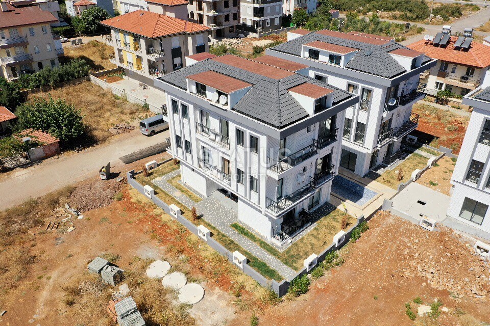 Прекрасный вариант трехкомнатной квартиры в развивающемся районе Анталии Дошемеалтые фото 5