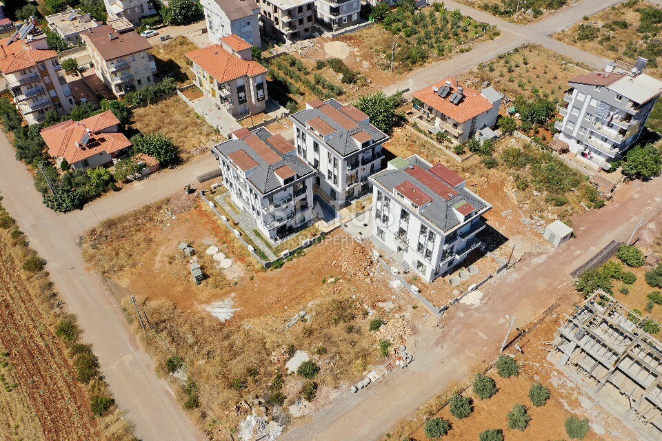 Прекрасный вариант трехкомнатной квартиры в развивающемся районе Анталии Дошемеалтые фото 8