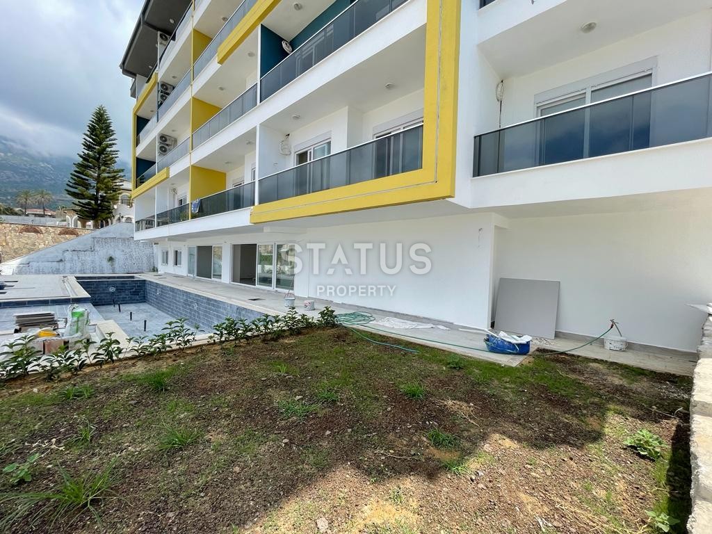 Прекрасная квартира в Махмутларе в комплексе с отельной инфраструктурой фото 6