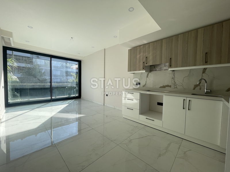 Квартира 1+1 в новом комплексе в центре Аланьи, 55 м2 (р-он Клеопатра) фото 2